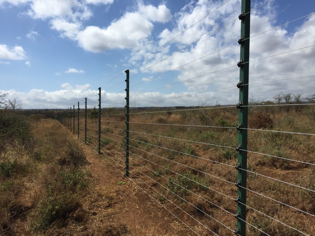 A solar-powered Free standing farm electric fence in Kenya using steel posts and 2.5mm high tensile fencing wire